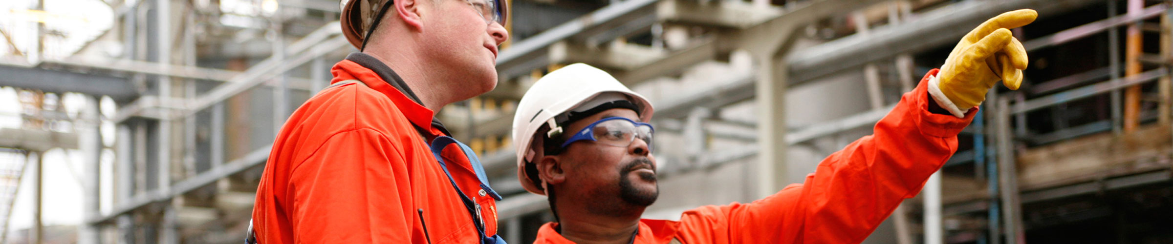 Safelift header image showing two men dress in construction clothing